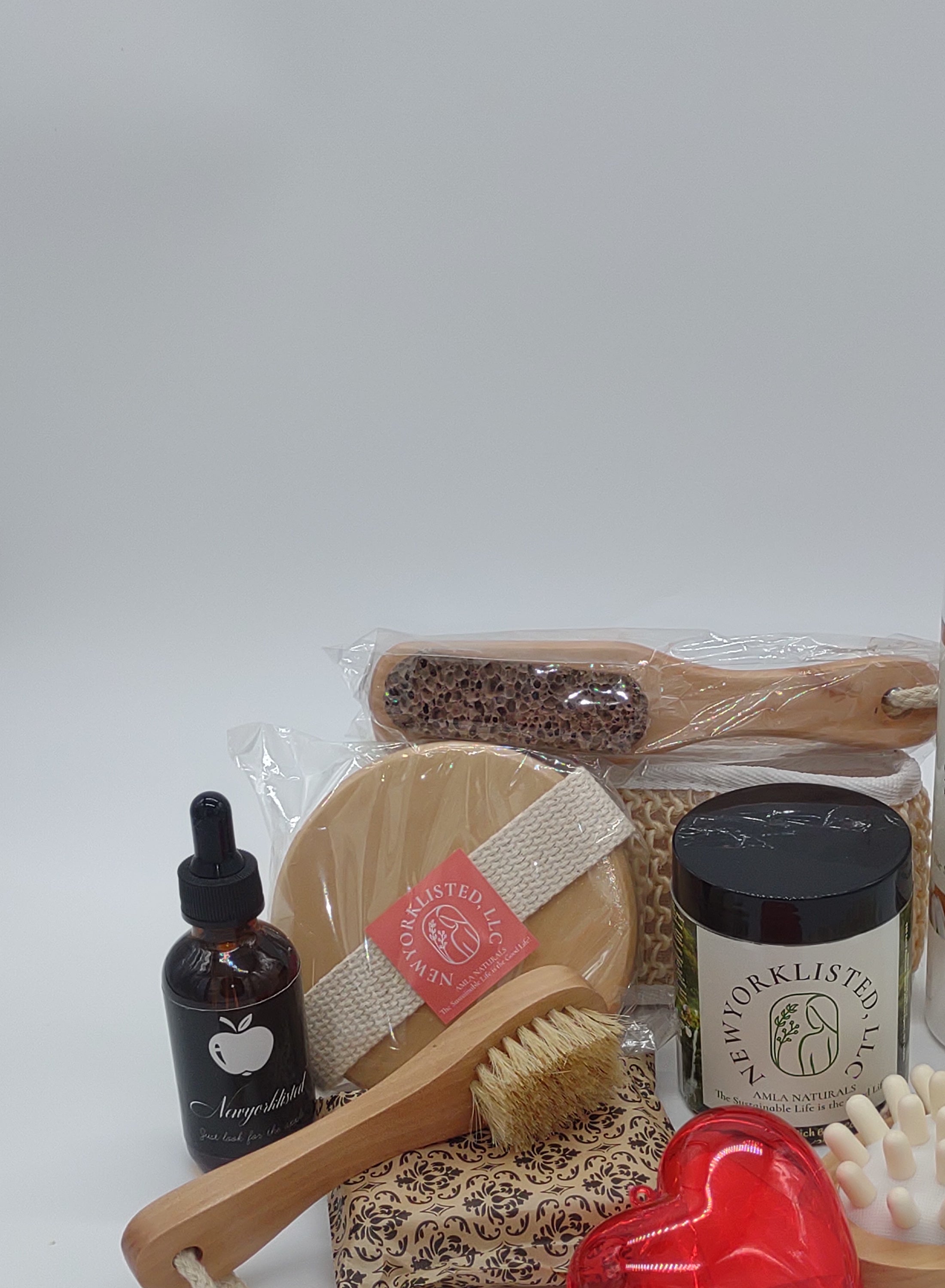 NEWYORKLISTED Valentine’s Day Luxury Spa Gift Basket, Collection of natural skincare and grooming products on a white background