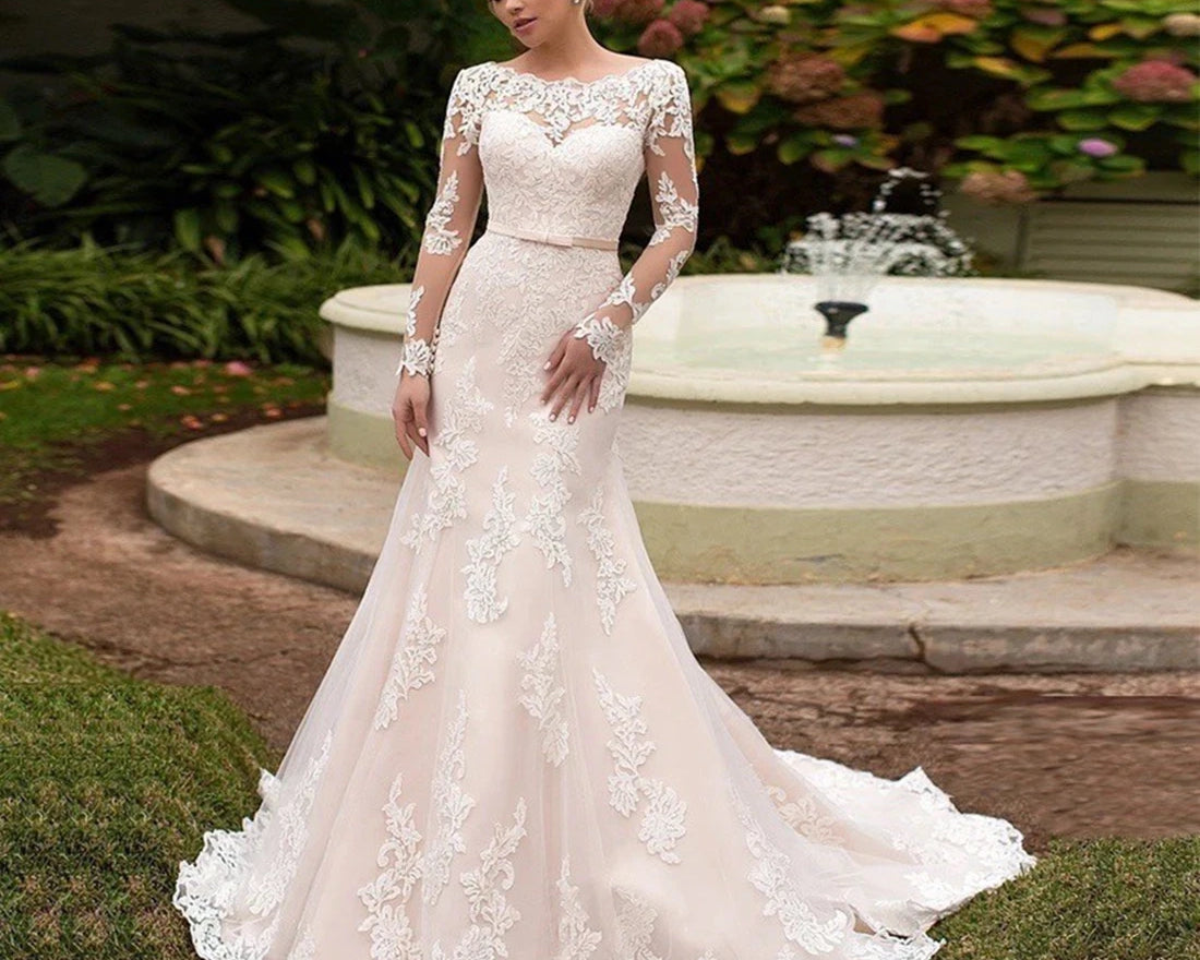 Backless long sleeve lace wedding dress with O-neckline and court train from NEWYORKLISTED Elegant Bride Collection.