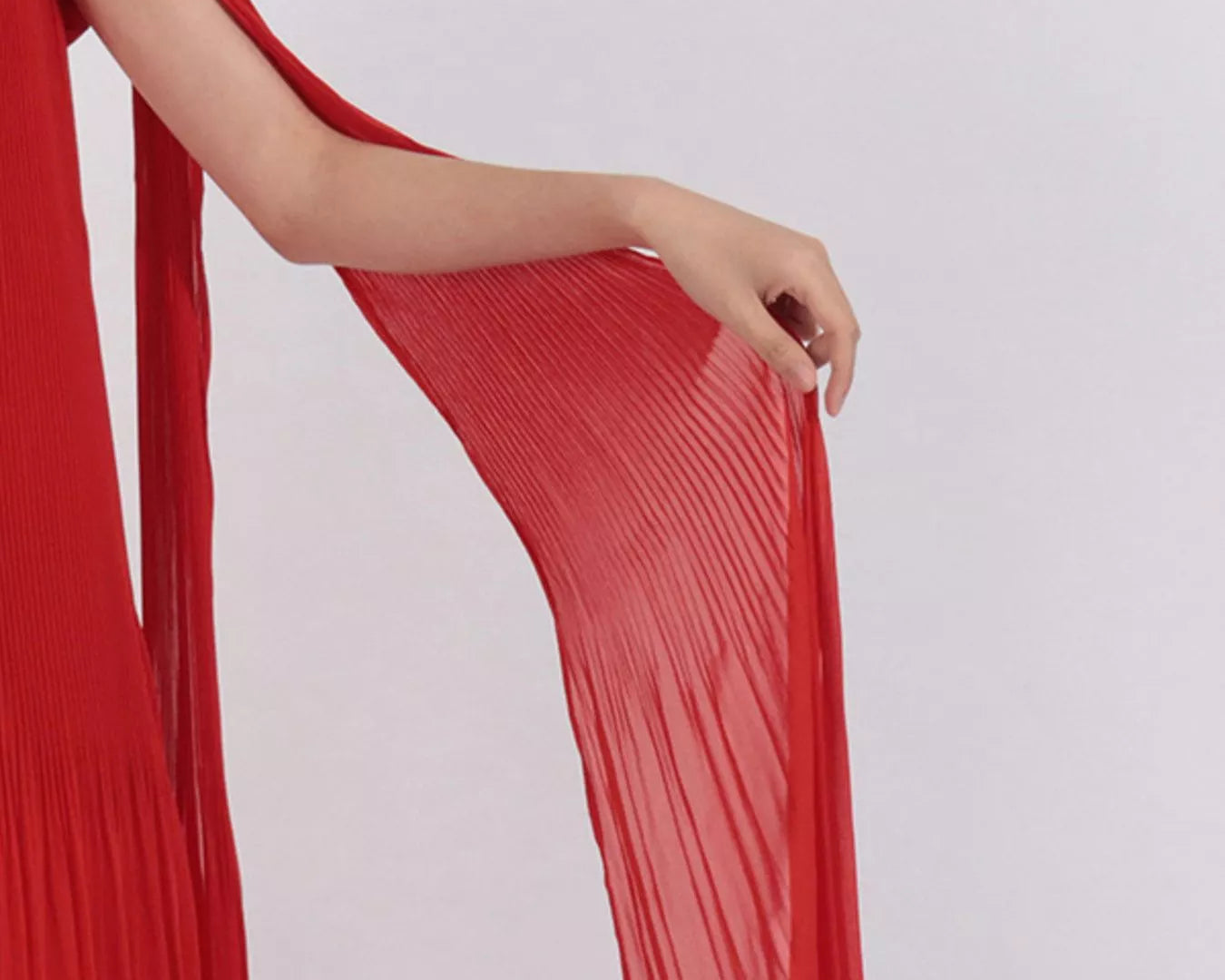 NEWYORKLISTED STYLE COLLECTION: Red dress with floral details on a white background