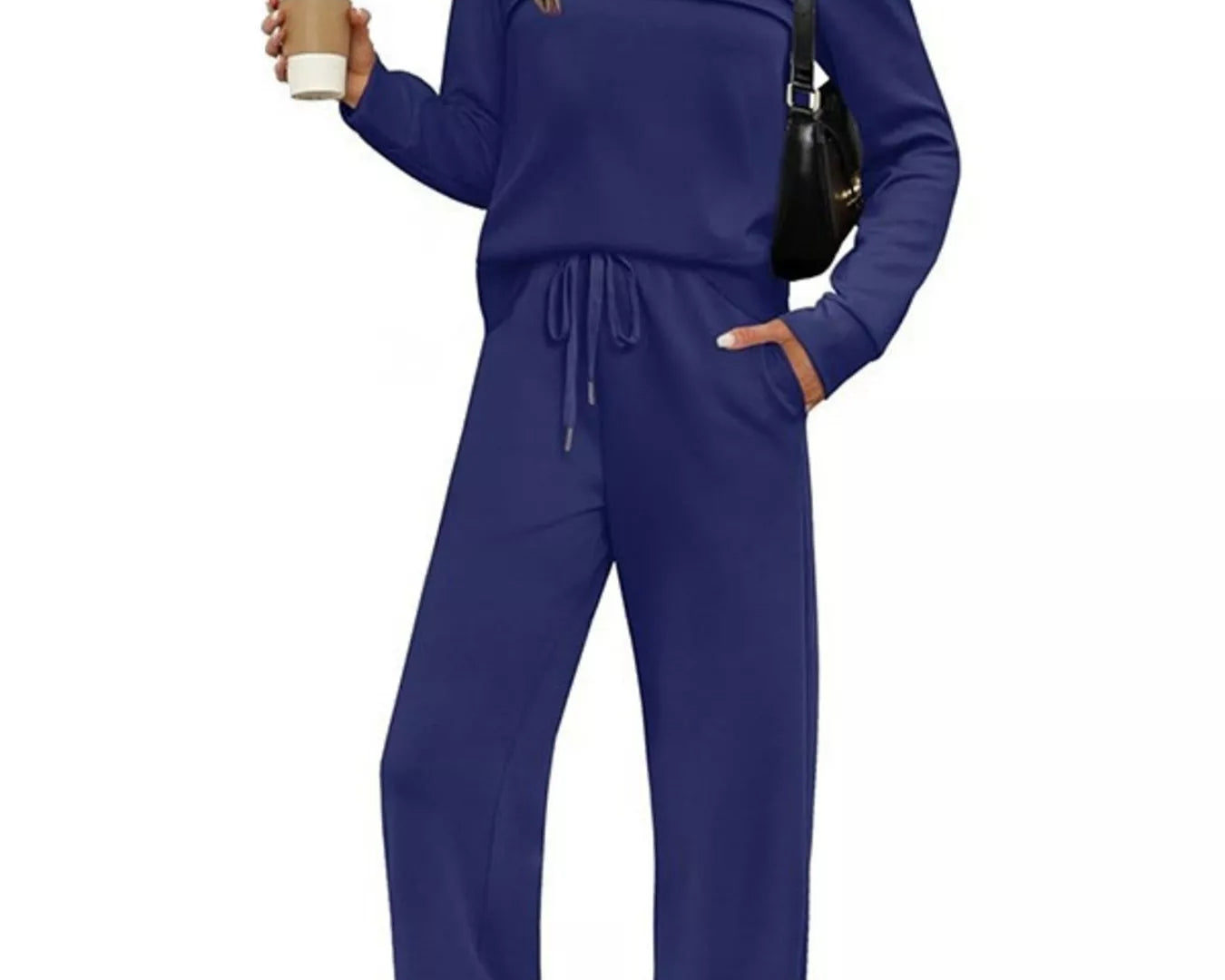 NEWYORKLISTED COMFORT COLLECTION: Woman wearing a blue outfit holding a coffee cup on a white background
