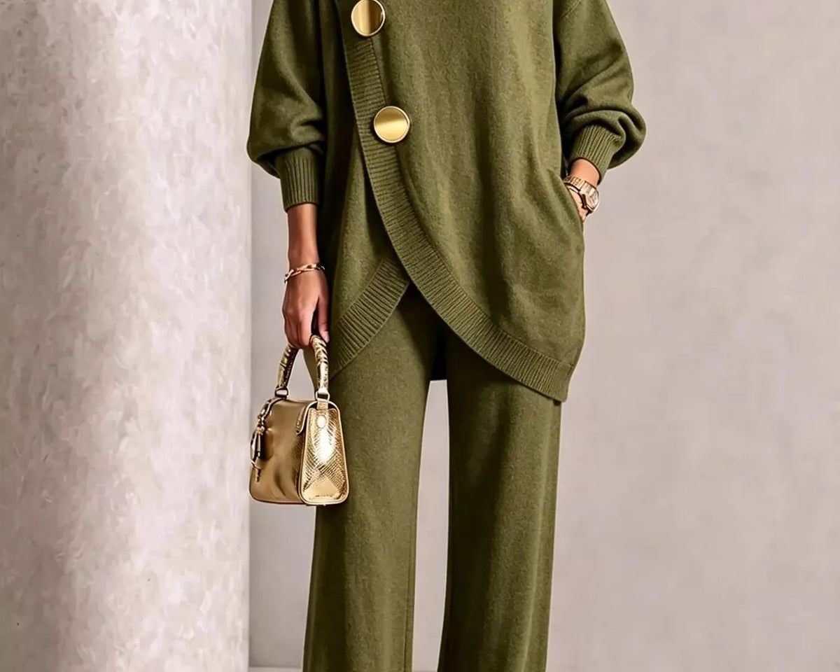 NEWYORKLISTED STYLE COLLECTION: A model wearing an olive green knit turtleneck sweater and matching wide-leg trousers, styled with gold-tone accessories including a metallic handbag and pointed shoes.