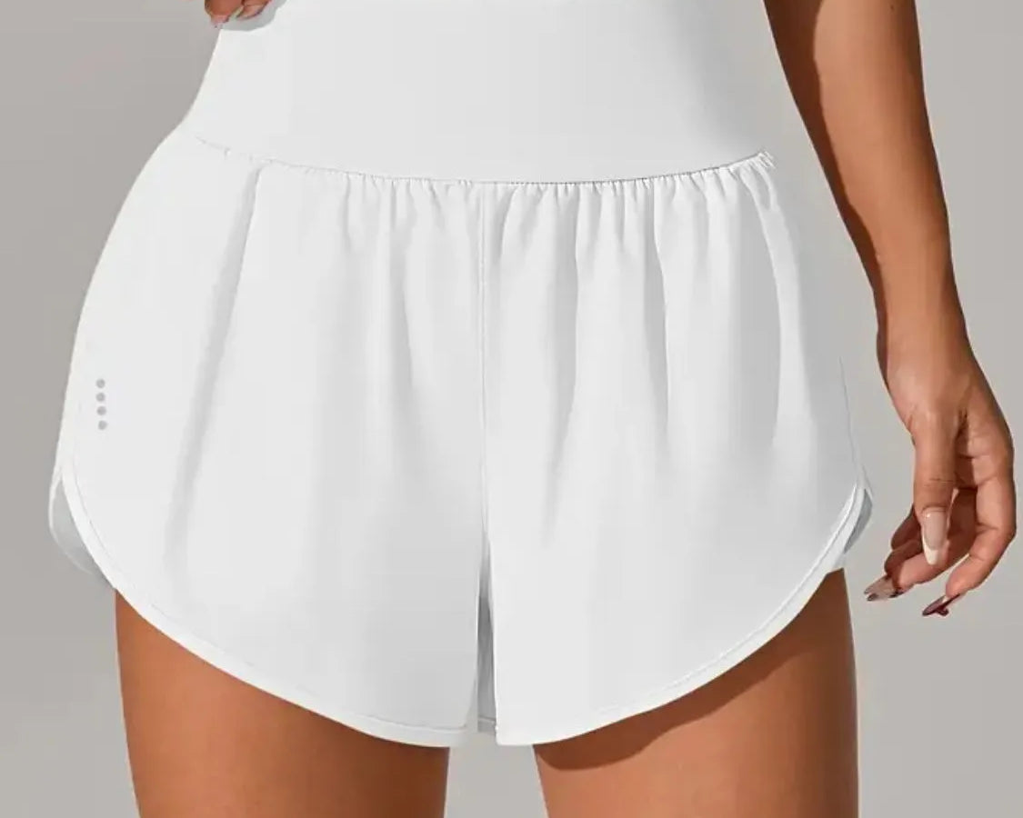 NEWYORKLISTED Activewear: White athletic shorts worn by a person on a neutral background