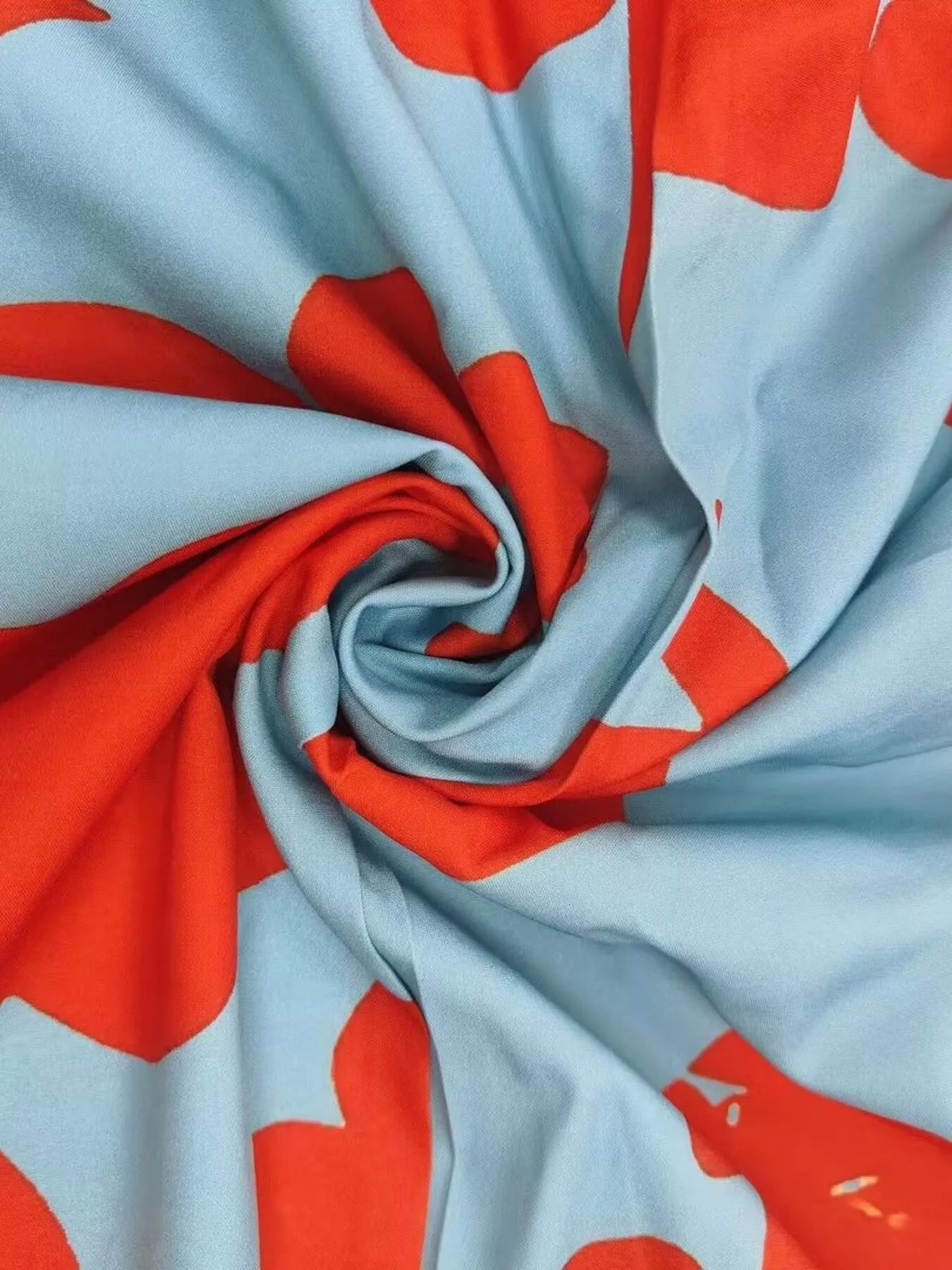 NEWYORKLISTED STYLE COLLECTION: Fabric with red and light blue pattern
