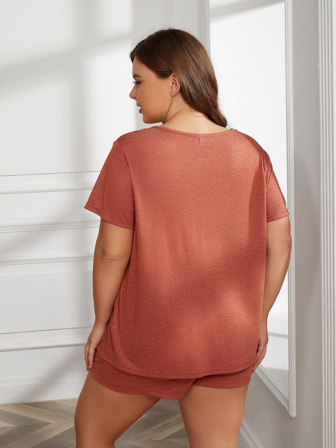 NEWYORKLISTED Intimate Apparel Collection: Woman wearing a rust-colored outfit standing in a room with white walls.