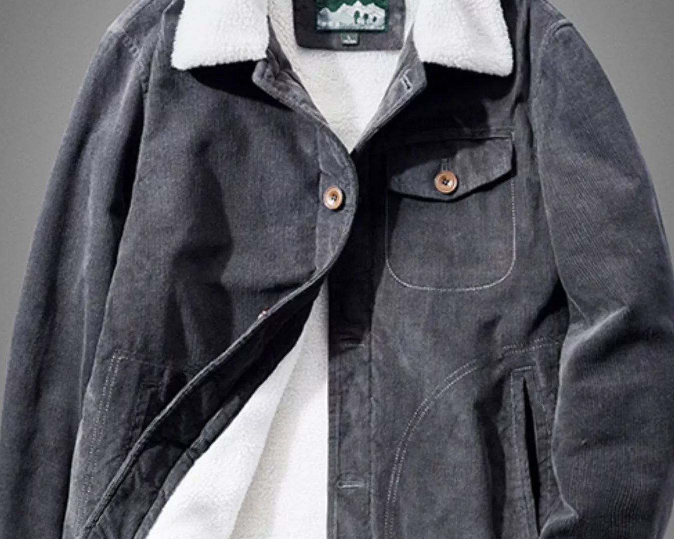 NEWYORKLISTED ATLAS MEN'S COLLECTION: Gray jacket with white lining and brand tag on a gray background