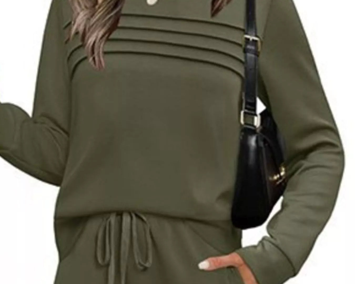 NEWYORKLISTED COMFORT COLLECTION: Woman wearing an olive green outfit with a black handbag on a white background