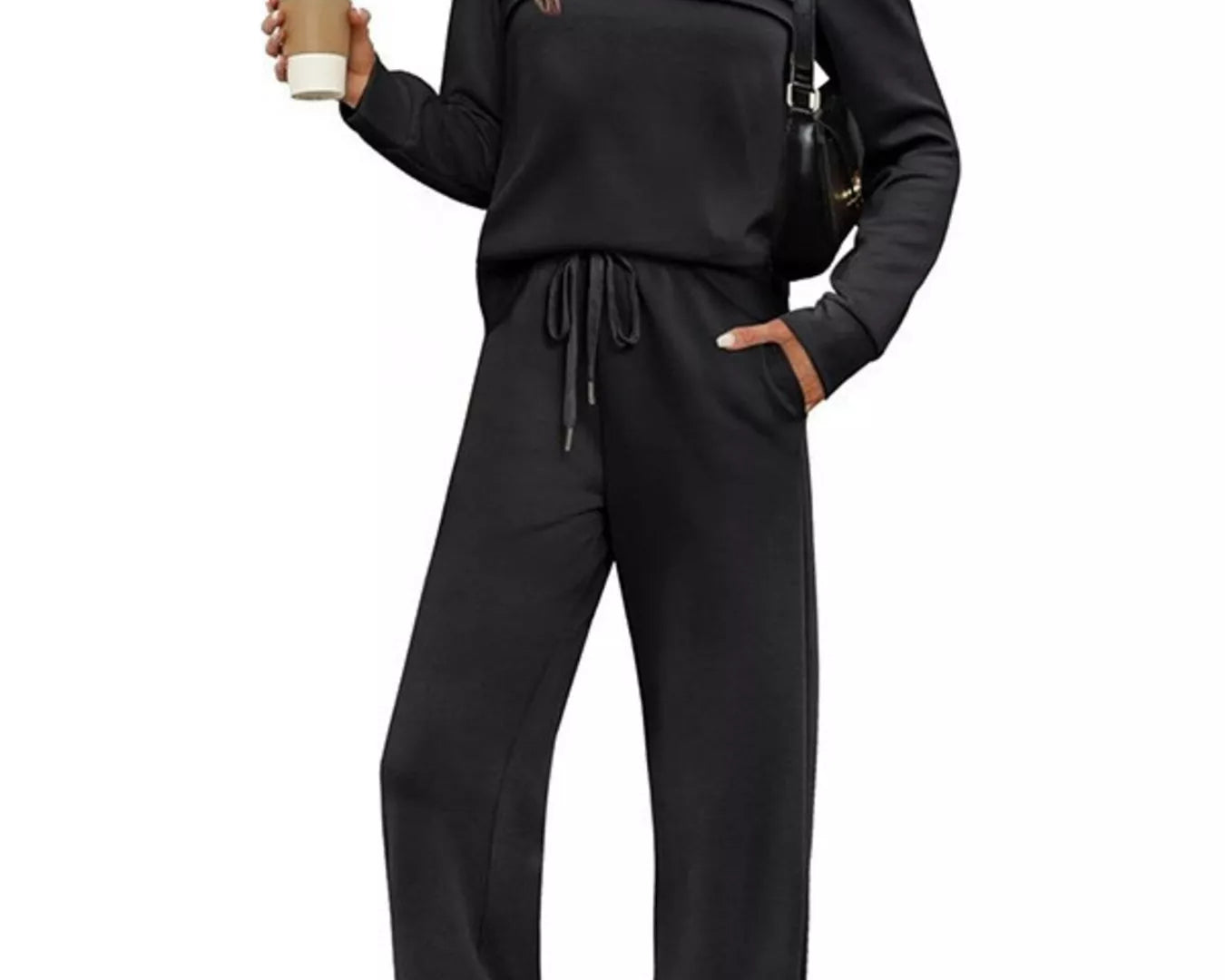 NEWYORKLISTED COMFORT COLLECTION: Woman wearing a black outfit with a white background
