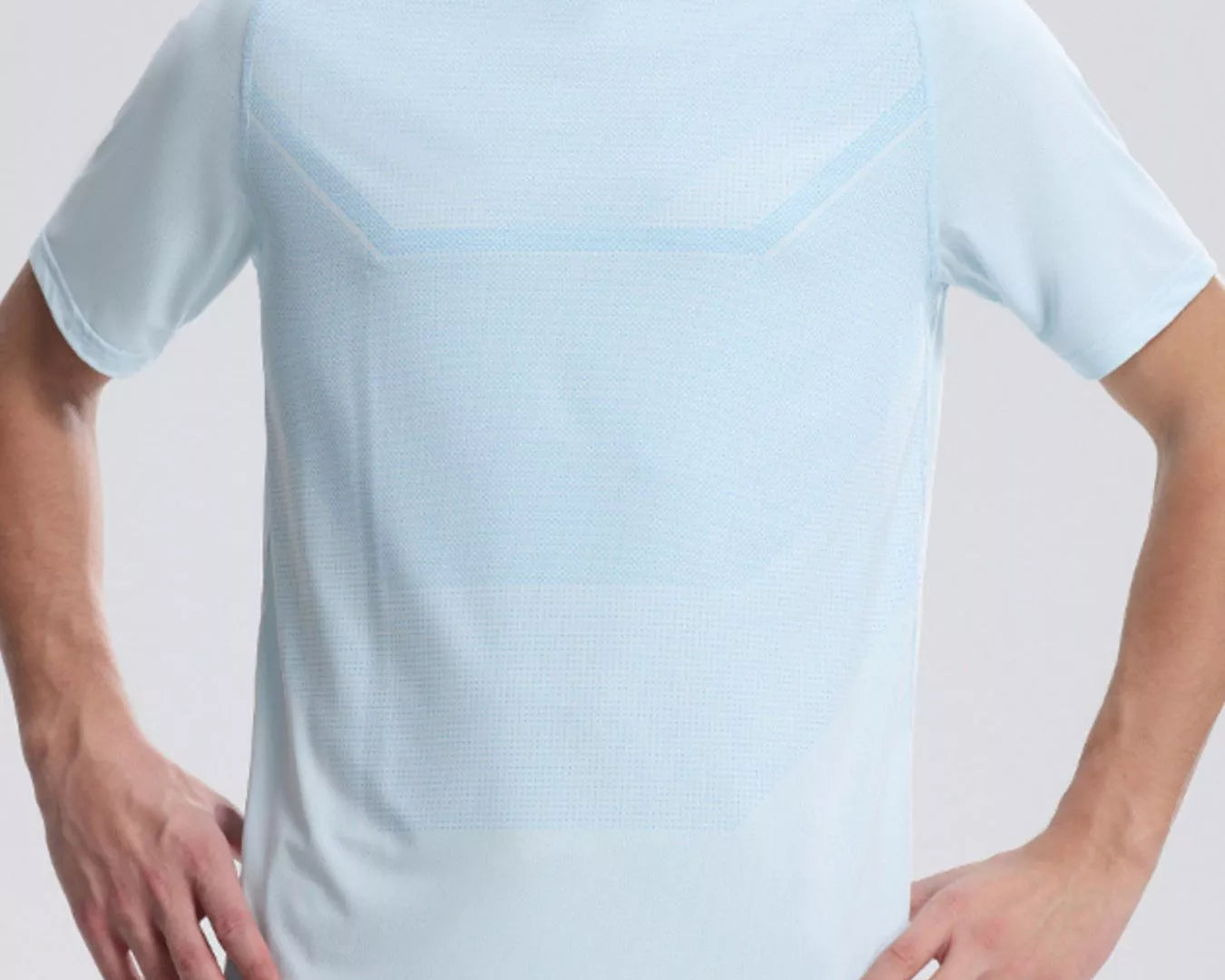 NEWYORKLISTED ATLAS MEN'S COLLECTION: Person wearing a light blue t-shirt against a plain background