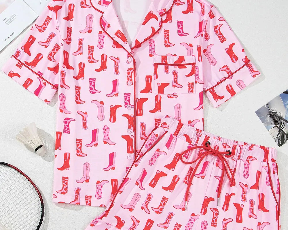NEWYORKLISTED Intimate Apparel: Pink pajama set with red boot pattern on a white background