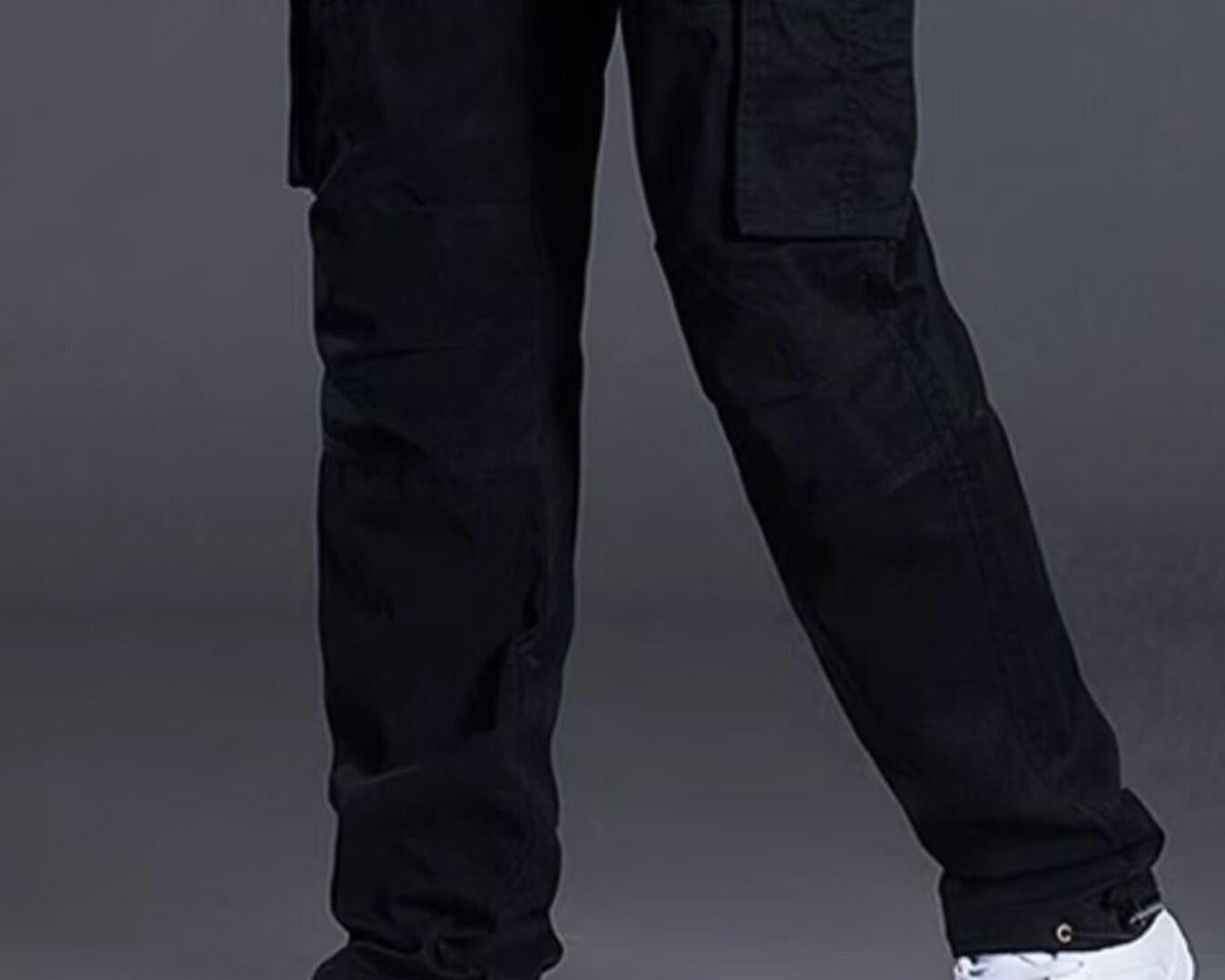 NEWYORKLISTED ATLAS MEN's COLLECTION: Black cargo pants worn by a person on a gray background