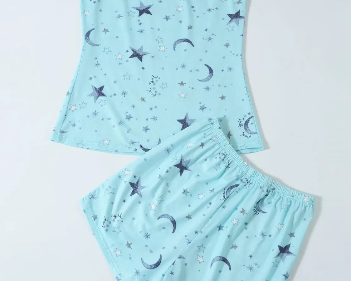 NEWYORKLISTED Intimate Apparel: Light blue pajama set with star and moon pattern on a white background