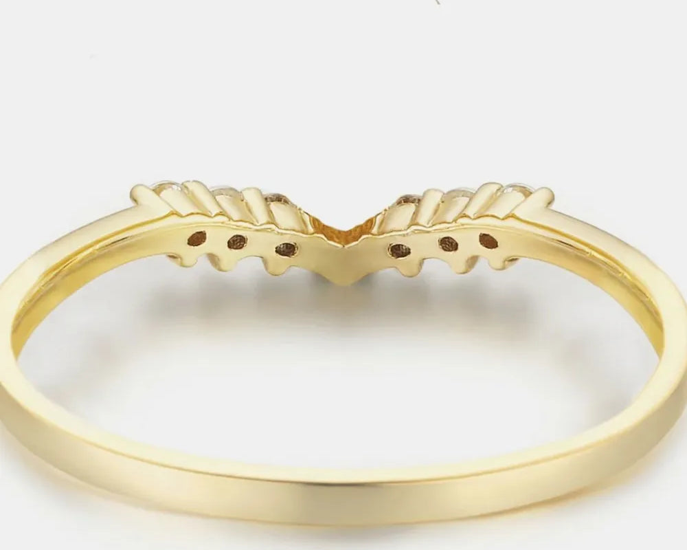 NEWYORKLISTED Valentine's Day Specials: Gold ring with a unique design on a white background