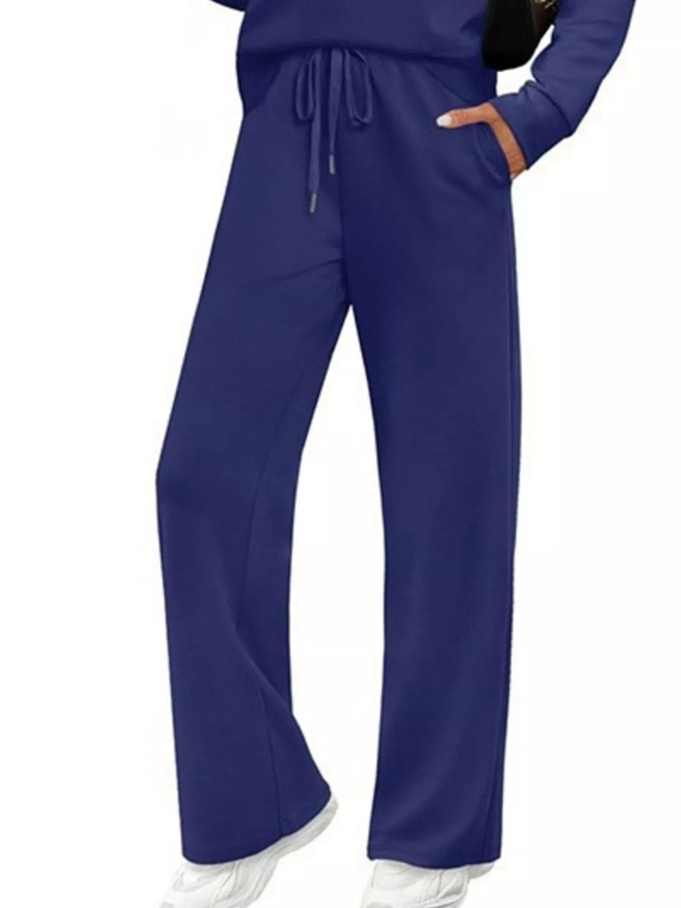 NEWYORKLISTED COMFORT COLLECTION: Blue scrubs set on a white background
