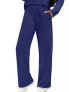 NEWYORKLISTED COMFORT COLLECTION: Blue scrubs set on a white background