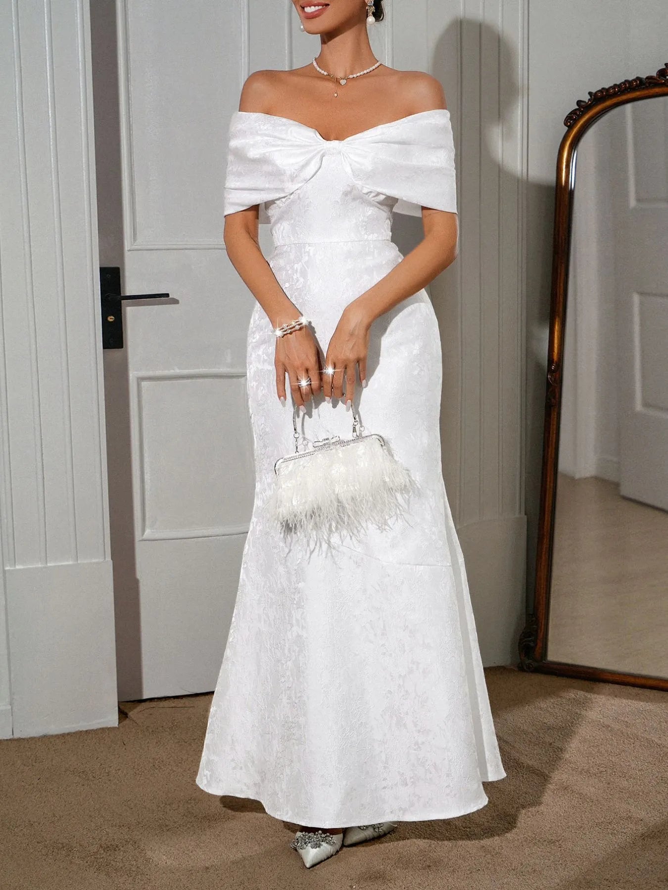 Off-shoulder bow maxi dress with lace-up back in NEWYORKLISTED STYLE COLLECTION – elegant, dramatic, and feminine