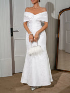 Off-shoulder bow maxi dress with lace-up back in NEWYORKLISTED STYLE COLLECTION – elegant, dramatic, and feminine