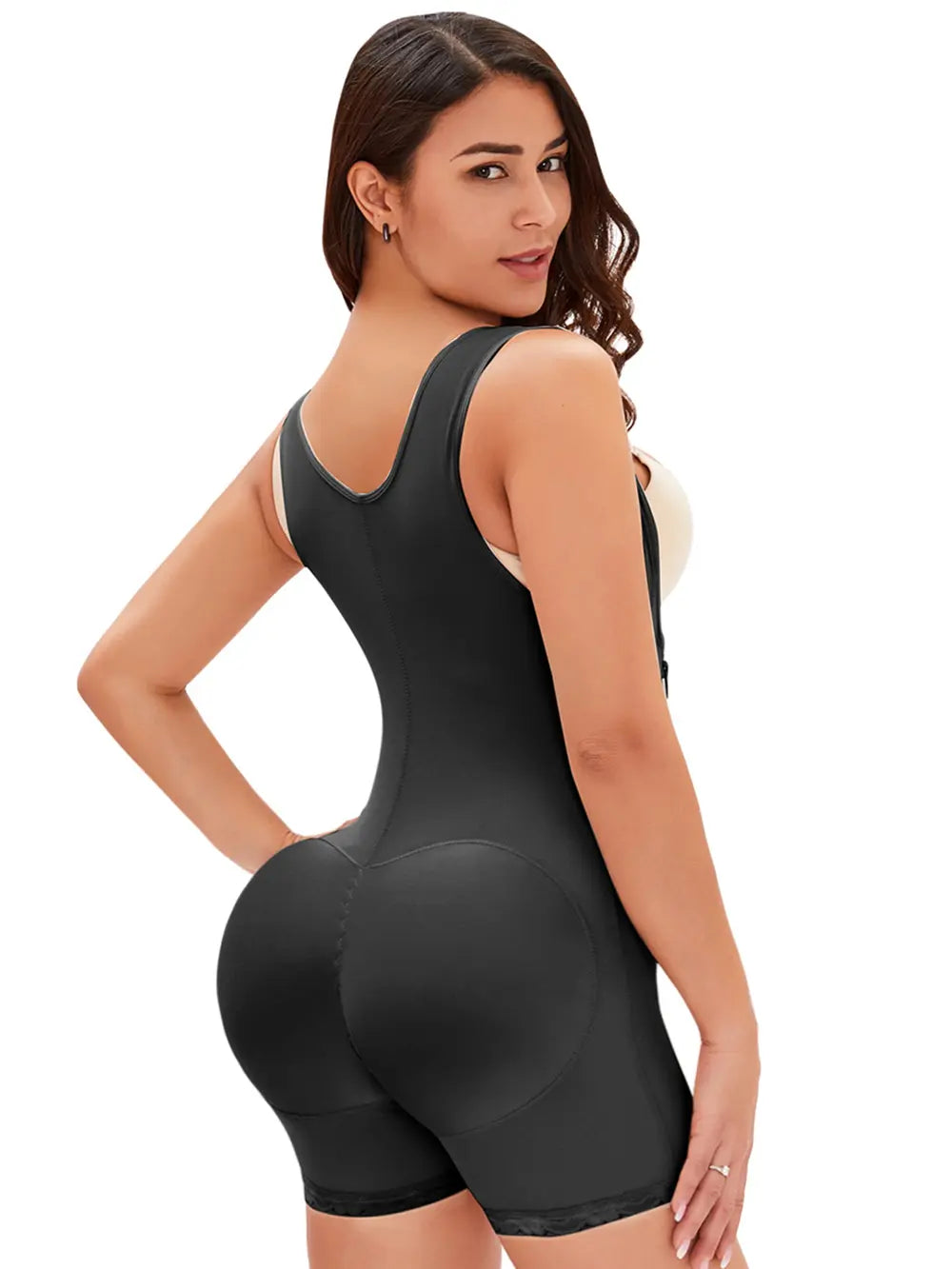 NEWYORKLISTED Intimate Apparel: Woman wearing a black shapewear bodysuit on a white background