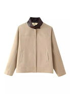 NEWYORKLISTED STYLE COLLECTION Beige jacket with a brown collar on a white background