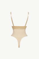 NEWYORKLISTED Intimate Apparel: Beige swimsuit with thin straps on a white background