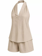 NEWYORKLISTED STYLE COLLECTION: Beige sleeveless top and shorts set on a white background