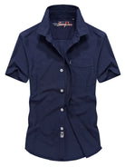 NEWYORKLISTED ATLAS COLLECTION: Navy blue short-sleeve shirt on a white background
