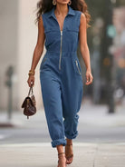 NEWYORKLISTED STYLE COLLECTION: Woman wearing a blue jumpsuit walking on a street.