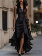 NEWYORKLISTED STYLE COLLECTION: Woman wearing a black dress with a blurred street background