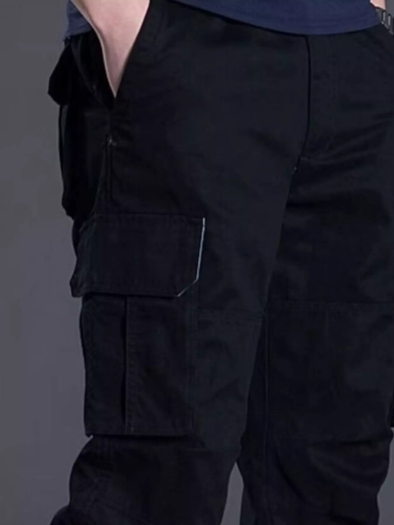 NEWYORKLISTED ATLAS MEN's COLLECTION: Black cargo pants on a gray background