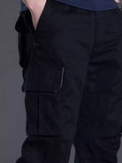 NEWYORKLISTED ATLAS MEN's COLLECTION: Black cargo pants on a gray background