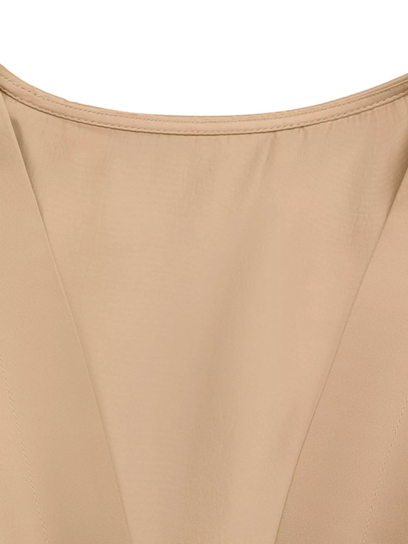 Close-up of beige fabric with a subtle texture