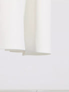 NEWYORKLISTED STYLE COLLECTION: Close-up of a white curtain with a blurred background