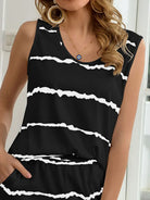 NEWYORKLISTED Intimate Apparel: Black sleeveless top with white stripes worn by a person indoors.