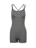 Gray gym suit with thin straps on a white background