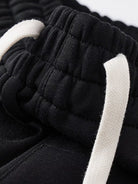 NEWYORKLISTED ATLAS MEN's COLLECTION: Close-up of black and white fabric with textured pattern