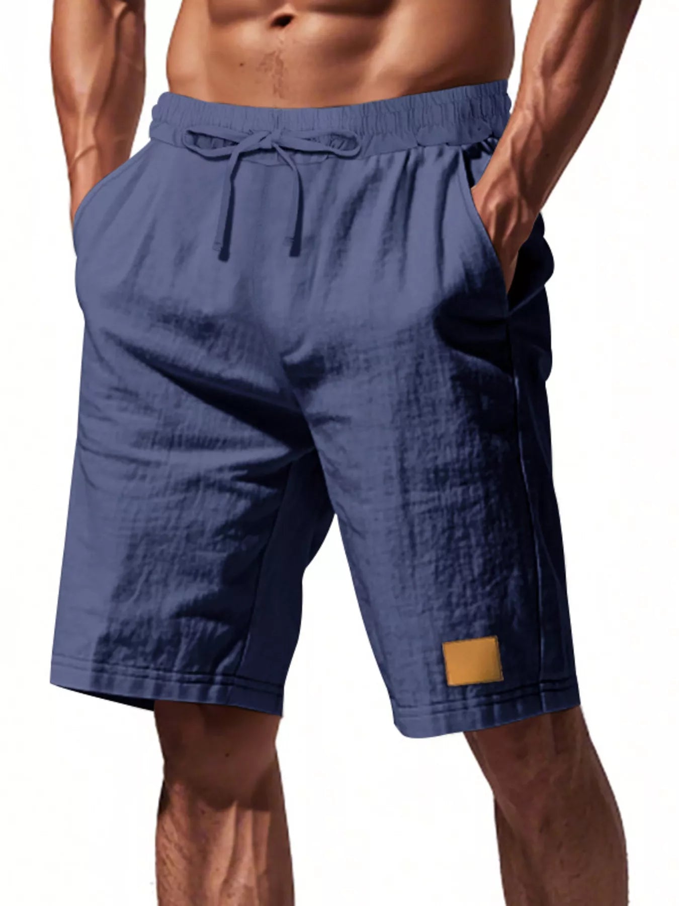 NEWYORKLISTED ATLAS MEN'S COLLECTION: Blue shorts worn by a person on a white background