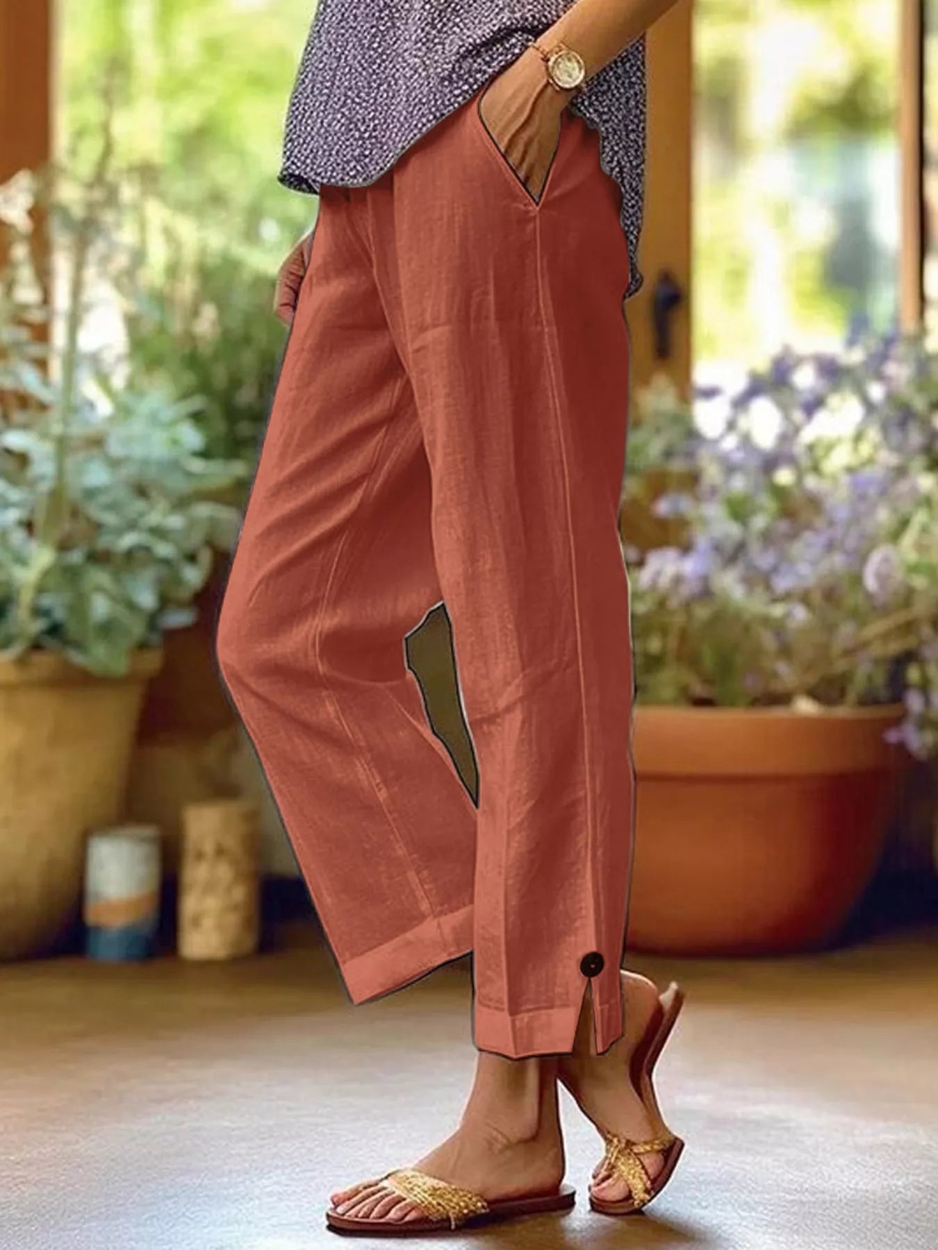 NEWYORKLISTED STYLE COLLECTION: Person wearing pink pants with a blurred indoor background