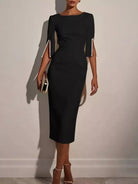 NEWYORKLISTED STYLE COLLECTION: Black dress with pearl embellishments on sleeves against a plain background