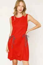 Sleeveless red tank dress with round neckline, drawstring waist, and pockets — NEWYORKLISTED STYLE COLLECTION.