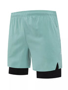 NEWYORKLISTED ATLAS MEN's COLLECTION: Light blue athletic shorts with black accents on a white background
