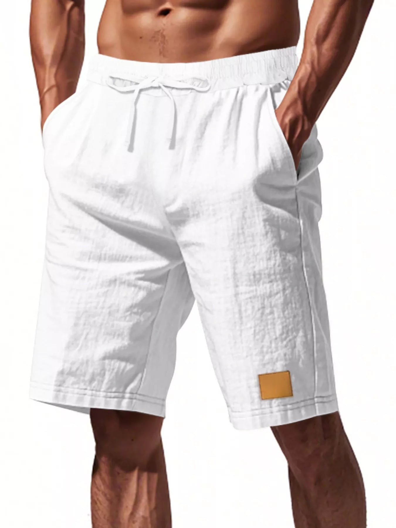 NEWYORKLISTED ATLAS MEN'S COLLECTION: White shorts with a small brown patch on a white background