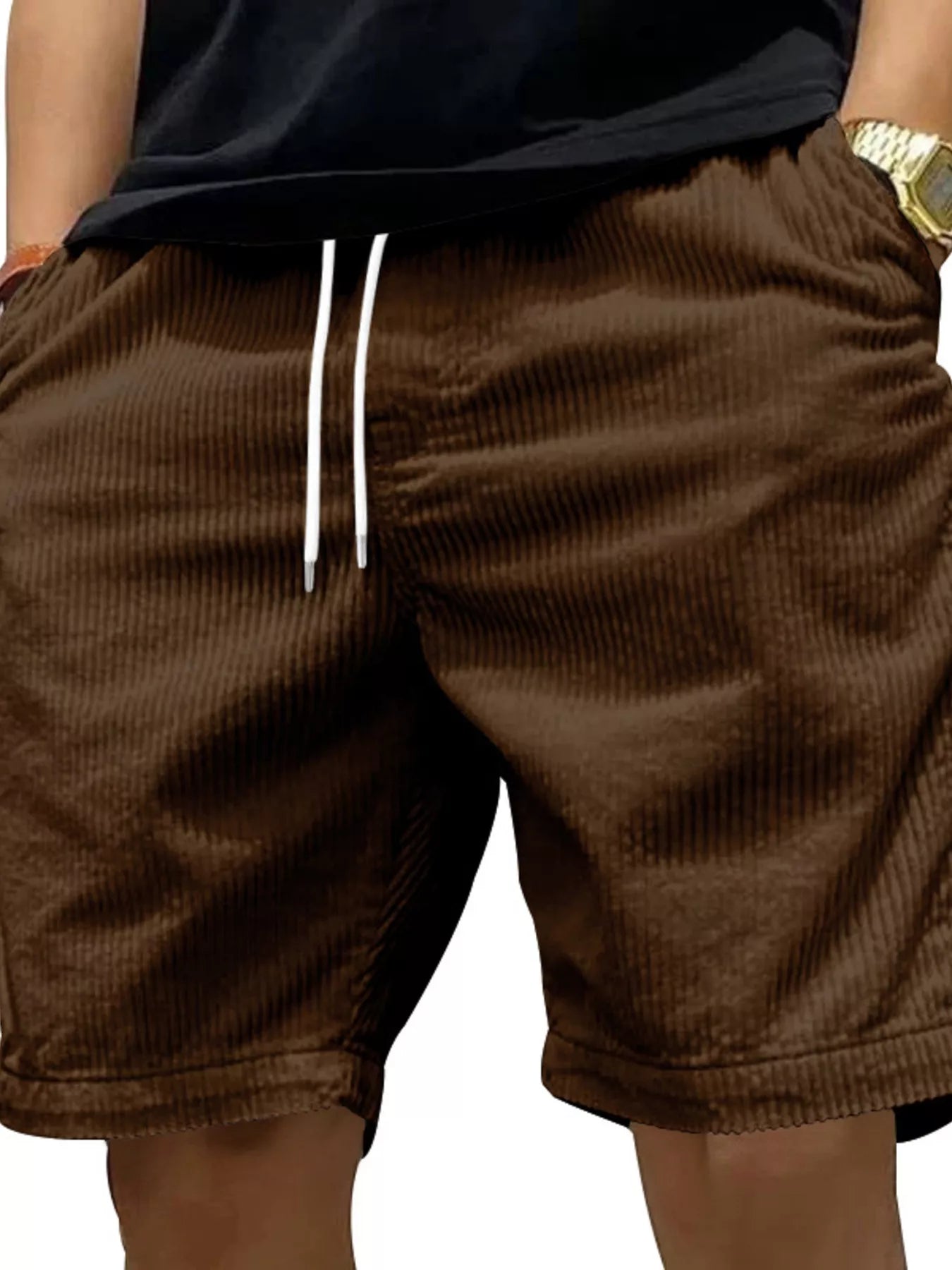 NEWYORKLISTED ATLAS MEN'S COLLECTION: Brown shorts with white drawstrings worn by a person on a white background