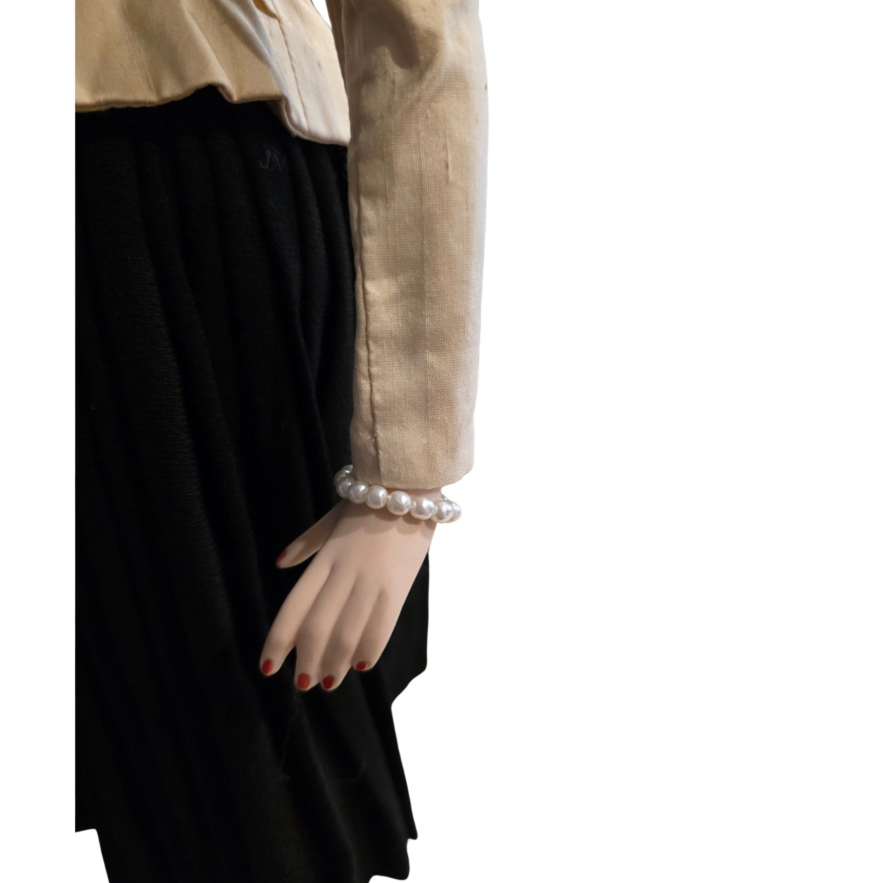 NEWYORKLISTED UNIQUE FINDS:  Dior New Look antique Porcelain Doll wearing a Bar Suit 