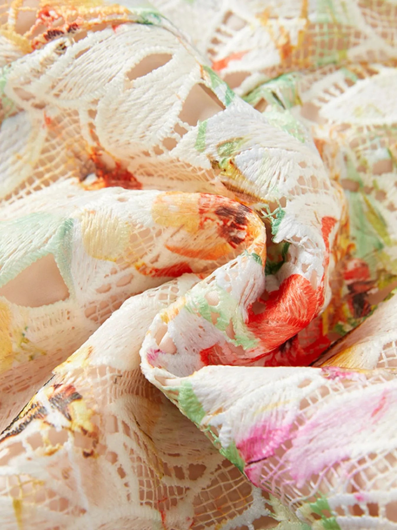 NEWYORKLISTED STYLE COLLECTION: Close-up of colorful fabric with floral patterns