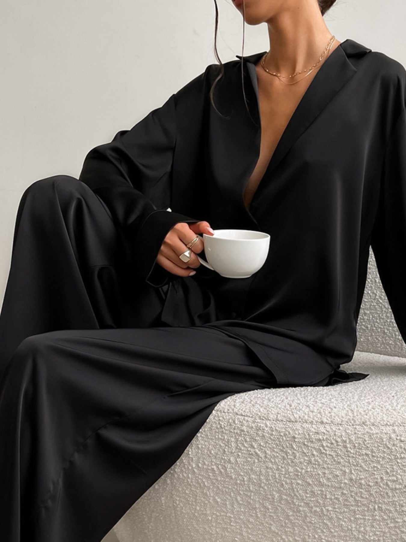 NEWYORKLISTED Intimate Apparel Collection: model wearing black lounge wear set 