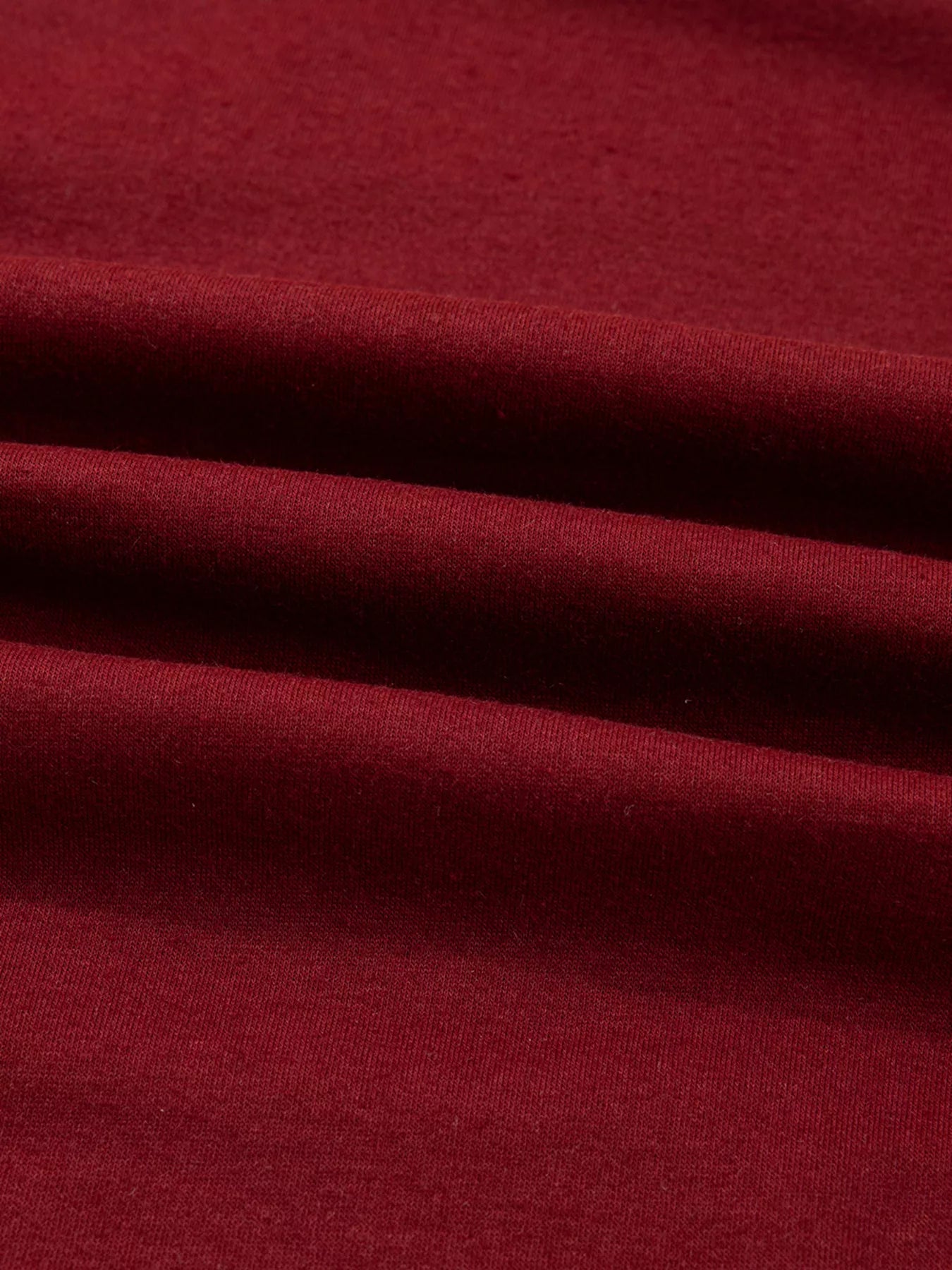 Close-up of red fabric with folds