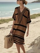 NEWYORKLISTED STYLE COLLECTION: Woman wearing a brown and black striped dress on a beach