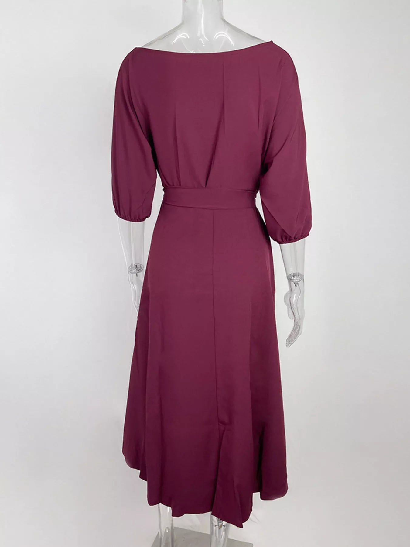 NEWYORKLISTED STYLE COLLECTION: Mauve dress on a mannequin against a white background