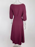 NEWYORKLISTED STYLE COLLECTION: Mauve dress on a mannequin against a white background