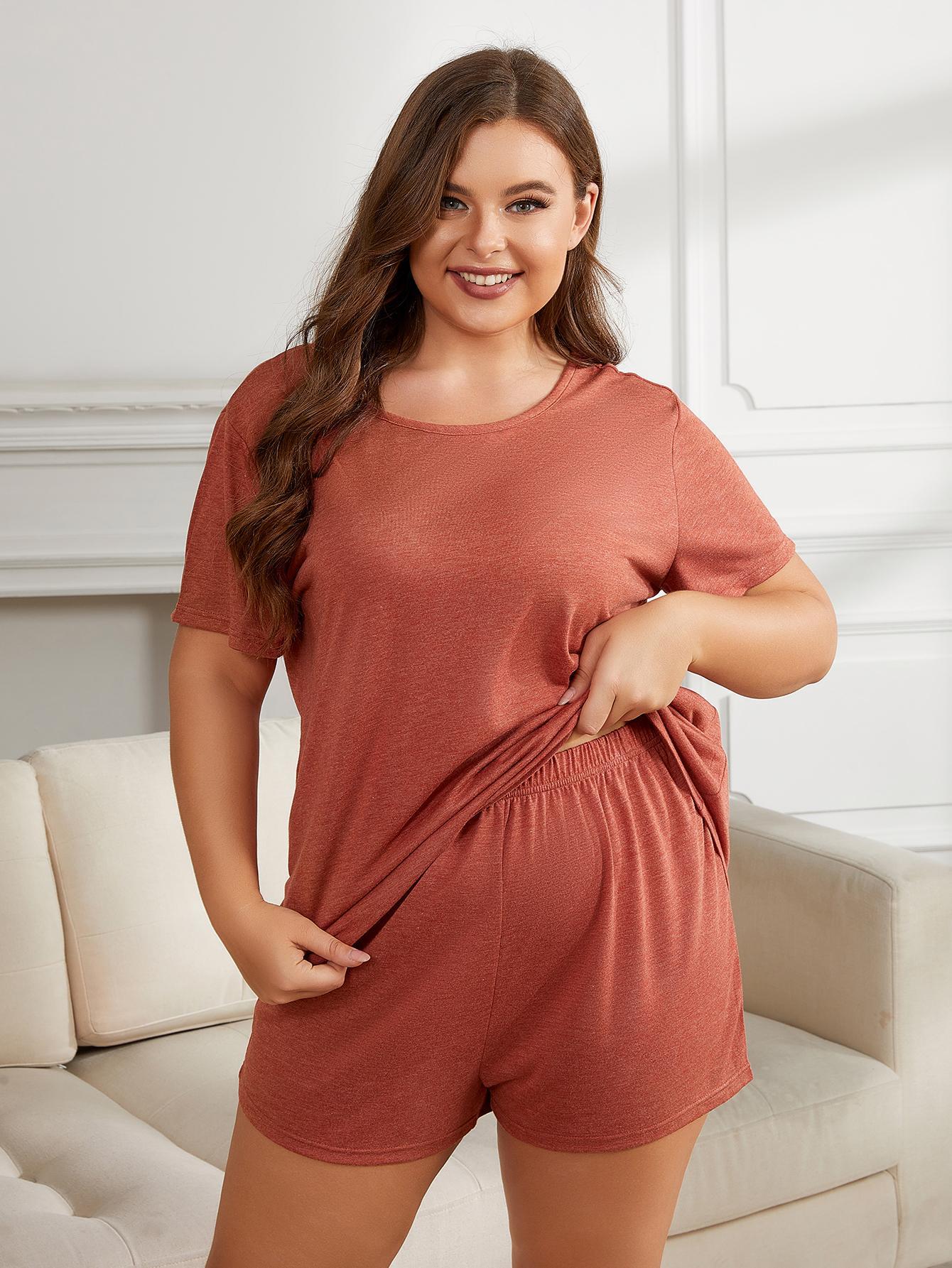 NEWYORKLISTED Intimate Apparel Collection: Woman wearing a terracotta-colored lounge set in a living room.