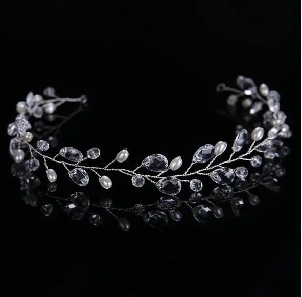 Silver hair vine with beads on a black background